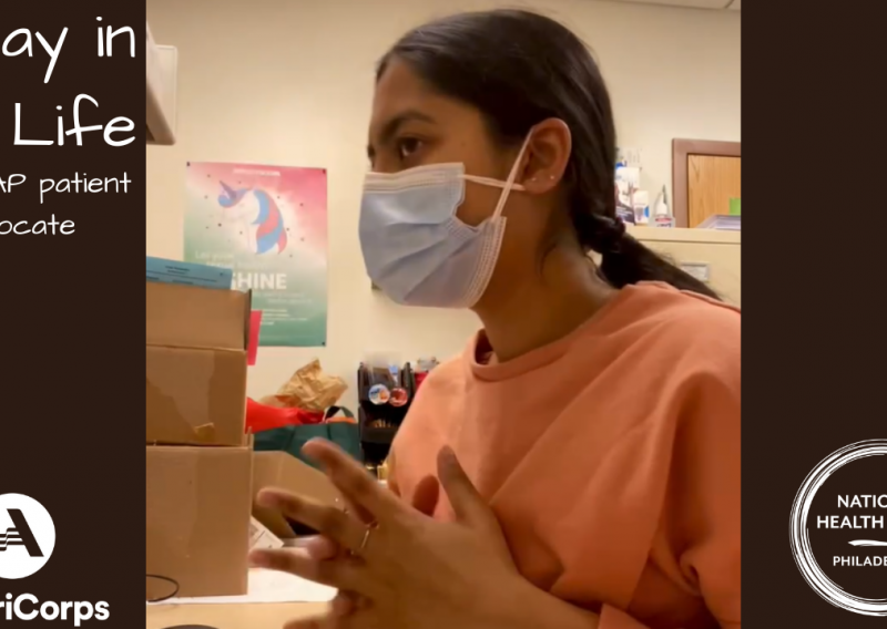 NHC member Pradhita sitting at her desk while on a call with a patient