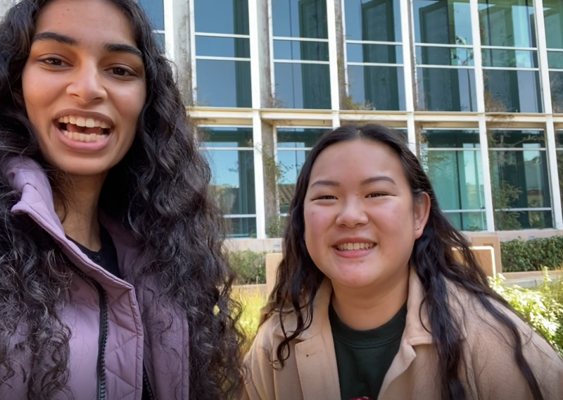 Anita and Cynthia are seen facing the camera smiling. 