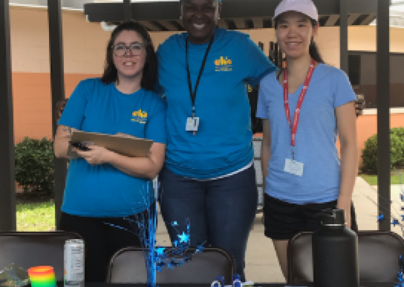 Pictured is Alison and other CHS employees tabling at an event