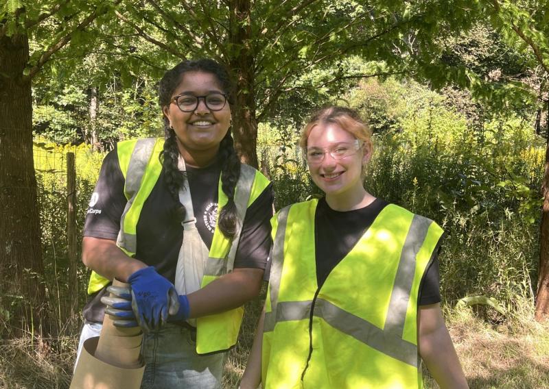 Aparna (left) and Elizabeth (right) pose together during an NHC Pittsburgh Service Day Event.