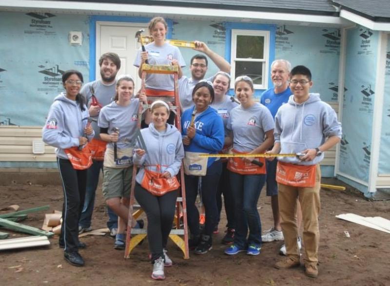 Group picture of members at the service project