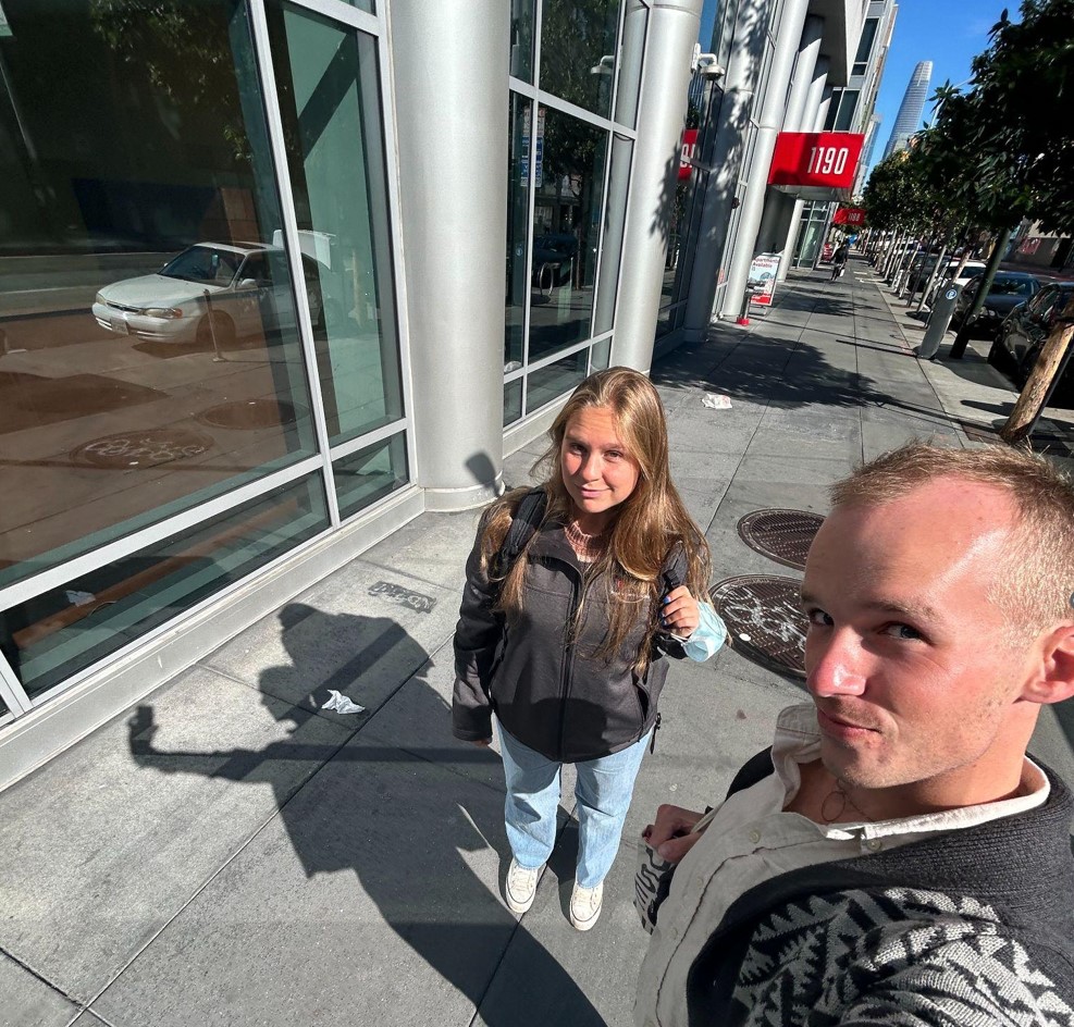 Hannah and fellow AmeriCorps member, John, taking a selfie together in the middle of the service day. 