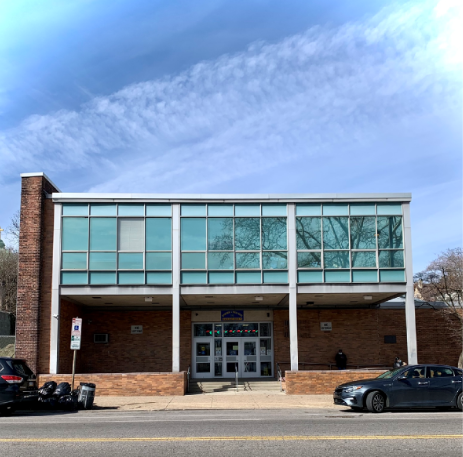 The outside of health center 9 on a sunny day